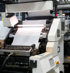 An additional angle of label material flowing through a machine