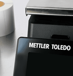 A Mettler Toledo scale dispensing a printed label