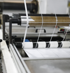 Labels being cut by an industrial machine