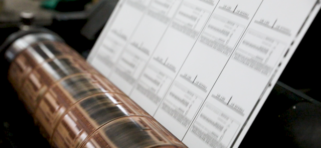 Bulk preprinted scale labels being printed